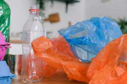 ways to reduce your plastic waste - plastic waste containing bottles and bags